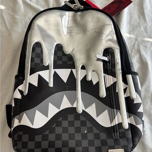 Sprayground Black and Silver Drip Backpack